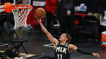ATLANTA, GEORGIA - JULY 03: Trae Young #11 of the Atlanta Hawks goes up for a shot against the Milwaukee Bucks during the second half in Game Six of the Eastern Conference Finals at State Farm Arena on July 03, 2021 in Atlanta, Georgia NOTE TO USER: User expressly acknowledges and agrees that, by downloading and or using this photograph, User is consenting to the terms and conditions of the Getty Images License Agreement. (Photo by Kevin C. Cox/Getty Images)