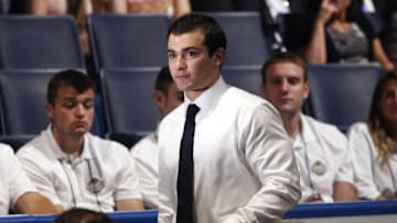 Jun 24, 2016; Buffalo, NY, USA; Luke Kunin walks to the stage after being selected as the number fifteen overall draft pick by the Minnesota Wild in the first round of the 2016 NHL Draft at the First Niagra Center. Mandatory Credit: Timothy T. Ludwig-USA TODAY Sports