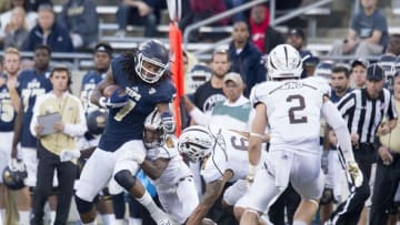 Oct 15, 2016; Akron, OH, USA; Akron Zips wide receiver Jerome Lane (7) runs the ball in the fourth quarter against the Western Michigan Broncos at InfoCision Stadium. Western Michigan Broncos won 41-0. Mandatory Credit: Jason Mowry-USA TODAY Sports
