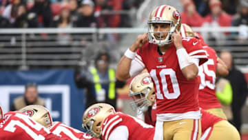 SANTA CLARA, CA - DECEMBER 24: Jimmy Garoppolo #10 of the San Francisco 49ers signalsto his team during their NFL game against the Jacksonville Jaguars at Levi's Stadium on December 24, 2017 in Santa Clara, California. (Photo by Robert Reiners/Getty Images)