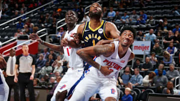 DETROIT, MI - OCTOBER 28: Tony Snell #17 of the Detroit Pistons, T.J. Warren #1 of the Indiana Pacers and Christian Wood #35 of the Detroit Pistons fight for the rebound on October 28, 2019 at Little Caesars Arena in Detroit, Michigan. NOTE TO USER: User expressly acknowledges and agrees that, by downloading and/or using this photograph, User is consenting to the terms and conditions of the Getty Images License Agreement. Mandatory Copyright Notice: Copyright 2019 NBAE (Photo by Brian Sevald/NBAE via Getty Images)