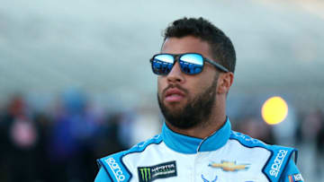 FORT WORTH, TEXAS - NOVEMBER 02: Bubba Wallace, driver of the #43 Covert Auto Group Chevrolet, walks on the grid during the Salute to Veterans Qualifying Day Fueled by The Texas Lottery for the Monster Energy NASCAR Cup Series AAA Texas 500 at Texas Motor Speedway on November 02, 2019 in Fort Worth, Texas. (Photo by Sean Gardner/Getty Images)