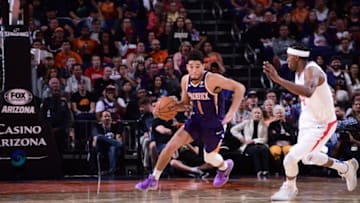 PHOENIX, AZ - OCTOBER 26: Devin Booker #1 of the Phoenix Suns handles the ball against the LA Clippers on October 26, 2019 at Talking Stick Resort Arena in Phoenix, Arizona. NOTE TO USER: User expressly acknowledges and agrees that, by downloading and or using this photograph, user is consenting to the terms and conditions of the Getty Images License Agreement. Mandatory Copyright Notice: Copyright 2019 NBAE (Photo by Michael Gonzales/NBAE via Getty Images)