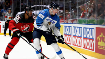 BRATISLAVA, SLOVAKIA - MAY 26: Darnell Nurse #25 of Canada challenges Kaapo Kakko #24 of Finland during the 2019 IIHF Ice Hockey World Championship Slovakia final game between Canada and Finland at Ondrej Nepela Arena on May 26, 2019 in Bratislava, Slovakia. (Photo by Martin Rose/Getty Images)