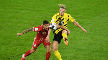 Bayern Munich and Borussia Dortmund will battle on Saturday (Photo by ANDREAS GEBERT/POOL/AFP via Getty Images)