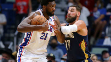 Joel Embiid #21 of the Philadelphia 76ers drives against Jonas Valanciunas #17 of the New Orleans Pelicans (Photo by Jonathan Bachman/Getty Images)