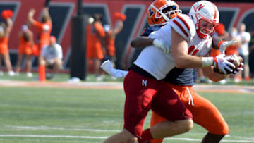 Auburn footballAug 28, 2021; Champaign, Illinois, USA; Nebraska Cornhuskers tight end Austin Allen (11) is tackled by Illinois fighting Illini defensive back Tony Adams (6) during the second half at Memorial Stadium. Mandatory Credit: Ron Johnson-USA TODAY Sports