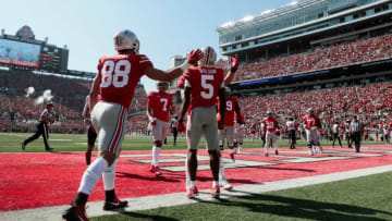 Ohio State Buckeyes wide receiver Garrett Wilson (5) celebrates after scoring a touchdown during the first quarter of a NCAA Division I football game between the Ohio State Buckeyes and the Maryland Terrapins on Saturday, Oct. 9, 2021 at Ohio Stadium in Columbus, Ohio.Cfb Maryland Terrapins At Ohio State Buckeyes