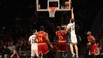 Jan 6, 2017; Brooklyn, NY, USA; Brooklyn Nets guard Bojan Bogdanovic (44) shoots the ball over Cleveland Cavaliers forward LeBron James (23) during the first quarter at Barclays Center. Mandatory Credit: Anthony Gruppuso-USA TODAY Sports