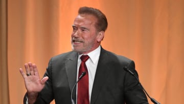 BEVERLY HILLS, CALIFORNIA - JULY 31: Arnold Schwarzenegger speaks onstage during Hollywood Foreign Press Association's Annual Grants Banquet at Regent Beverly Wilshire Hotel on July 31, 2019 in Beverly Hills, California. (Photo by Kevin Winter/Getty Images)