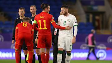 CARDIFF, WALES - NOVEMBER 15: Gareth Bale of Wales and Matt Doherty of Republic of Ireland. (Photo by Matthew Ashton - AMA/Getty Images)