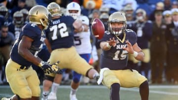 Nov 12, 2016; Annapolis, MD, USA; Navy Midshipmen quarterback Will Worth (15) pitches the ball to running back Toneo Gulley (2) during the second half at Navy Marine Corps Memorial Stadium. Mandatory Credit: Brad Mills-USA TODAY Sports