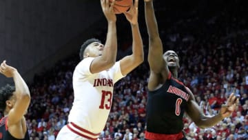 BLOOMINGTON, IN - DECEMBER 08: Juwan Morgan #13 of the Indiana Hoosiers shoots the ball against the Louisville Cardinals at Assembly Hall on December 8, 2018 in Bloomington, Indiana. (Photo by Andy Lyons/Getty Images)