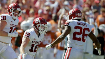 Oklahoma's Drake Stoops (12) celebrates after catching a pass to complete a two-point conversion during the Red River Showdown college football game between the University of Oklahoma Sooners (OU) and the University of Texas (UT) Longhorns at the Cotton Bowl in Dallas, Saturday, Oct. 9, 2021. Oklahoma won 55-48.Ou Vs Texas