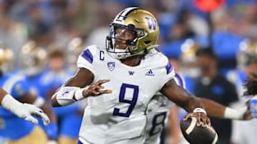 Sep 30, 2022; Pasadena, California, USA; Washington Huskies quarterback Michael Penix Jr. (9) sets to pass in the first half against the UCLA Bruins at the Rose Bowl. Mandatory Credit: Jayne Kamin-Oncea-USA TODAY Sports