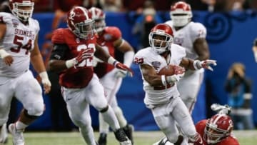 Jan 2, 2014; New Orleans, LA, USA; Oklahoma Sooners running back Roy Finch (22) runs against the Alabama Crimson Tide during the second half of a game at the Mercedes-Benz Superdome. Oklahoma defeated Alabama 45-31. Mandatory Credit: Derick E. Hingle-USA TODAY Sports