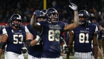 NEW YORK, NY - NOVEMBER 17: Chase Claypool #83 of the Notre Dame Fighting Irish celebrates a touchdown as against the Syracuse Orange during their game at Yankee Stadium on November 17, 2018 in New York, New York. (Photo by Jeff Zelevansky/Getty Images)