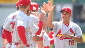 Apr 3, 2016; Pittsburgh, PA, USA; St. Louis Cardinals shortstop Ruben Tejada (19) greets teammates before playing the Pittsburgh Pirates at PNC Park. The Pirates won 4-1. Mandatory Credit: Charles LeClaire-USA TODAY Sports