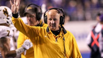 BOISE, ID - OCTOBER 24: Head coach Craig Bohl of the Wyoming Cowboys rallies his team at the start of the fourth quarter of the game against the Boise State Broncos on October 24, 2015 at Albertsons Stadium in Boise, Idaho. Boise State won the game 34-14. (Photo by Loren Orr/Getty Images)