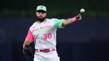 Jul 15, 2022; San Diego, California, USA; San Diego Padres first baseman Eric Hosmer (30) throws to first base on a ground out by Arizona Diamondbacks second baseman Sergio Alcantara (not pictured) during the seventh inning at Petco Park. Mandatory Credit: Orlando Ramirez-USA TODAY Sports