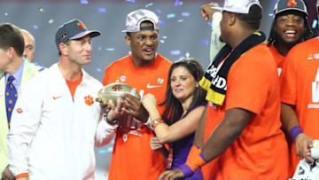 December 31, 2016; Glendale, AZ, USA; Clemson Tigers head coach Dabo Swinney and quarterback Deshaun Watson (4) celebrate the 31-0 victory against the Ohio State Buckeyes following the the 2016 CFP semifinal at University of Phoenix Stadium. Mandatory Credit: Mark J. Rebilas-USA TODAY Sports