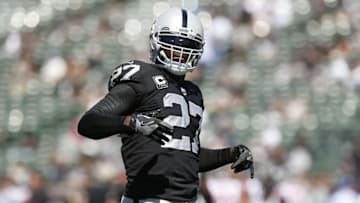 Sep 18, 2016; Oakland, CA, USA; Oakland Raiders free safety Reggie Nelson (27) stands on the field before the start of the game against the Atlanta Falcons at Oakland-Alameda County Coliseum. Mandatory Credit: Cary Edmondson-USA TODAY Sports