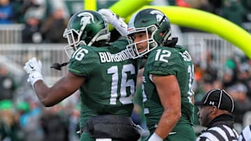 Nov 28, 2015; East Lansing, MI, USA; Michigan State Spartans wide receiver R.J. Shelton (12) and wide receiver Aaron Burbridge (16) celebrate a touchdown during the 1st quarter against the Penn State Nittany Lions at Spartan Stadium. Mandatory Credit: Mike Carter-USA TODAY Sports
