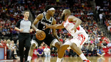 HOUSTON, TX - MARCH 30: De'Aaron Fox #5 of the Sacramento Kings dribbles the ball defended by Chris Paul #3 of the Houston Rockets in the third quarter at Toyota Center on March 30, 2019 in Houston, Texas. NOTE TO USER: User expressly acknowledges and agrees that, by downloading and or using this photograph, User is consenting to the terms and conditions of the Getty Images License Agreement. (Photo by Tim Warner/Getty Images)
