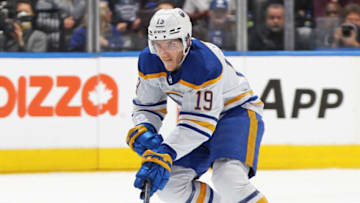 TORONTO, CANADA - MARCH 13: Peyton Krebs #19 of the Buffalo Sabres skates with the puck against the Toronto Maple Leafs during an NHL game at Scotiabank Arena on March 13, 2023 in Toronto, Ontario, Canada. The Sabres defeated the Maple Leafs 4-3. (Photo by Claus Andersen/Getty Images)