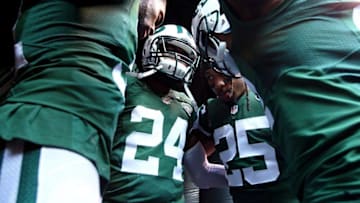 Dec 13, 2015; East Rutherford, NJ, USA; New York Jets corner back Darrelle Revis (24) and safety Calvin Pryor (25) huddle up during introductions before the first quarter against the Tennessee Titans at MetLife Stadium. Mandatory Credit: Brad Penner-USA TODAY Sports
