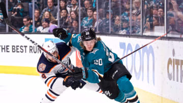 SAN JOSE, CA - JANUARY 08: Edmonton Oilers defenseman Kris Russell (4) brings down San Jose Sharks right wing Marcus Sorensen (20) during the San Jose Sharks game versus the Edmonton Oilers on January 8, 2019, at SAP Center in San Jose, CA (Photo by Matt Cohen/Icon Sportswire via Getty Images)