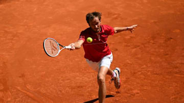 Russia's Daniil Medvedev returns the ball to Chile's Christian Garin during their 2021 ATP Tour Madrid Open tennis tournament singles match at the Caja Magica in Madrid on May 6, 2021. (Photo by GABRIEL BOUYS / AFP) (Photo by GABRIEL BOUYS/AFP via Getty Images)