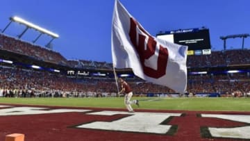 Dec 31, 2015; Miami Gardens, FL, USA; A member of the Oklahoma Sooners Ruf Neks waves a flag in the second quarter of the 2015 CFP Semifinal at the Orange Bowl at Sun Life Stadium. Mandatory Credit: John David Mercer-USA TODAY Sports