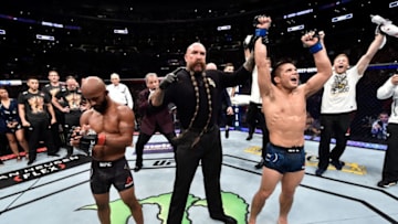 LOS ANGELES, CA - AUGUST 04: Henry Cejudo celebrates after his split-decision victory over Demetrious Johnson in their UFC flyweight championship fight during the UFC 227 event inside Staples Center on August 4, 2018 in Los Angeles, California. (Photo by Jeff Bottari/Zuffa LLC/Zuffa LLC via Getty Images)