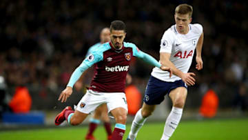LONDON, ENGLAND - JANUARY 04: Manuel Lanzini of West Ham United runs with the ball under pressure from Eric Dier of Tottenham Hotspur during the Premier League match between Tottenham Hotspur and West Ham United at Wembley Stadium on January 4, 2018 in London, England. (Photo by Julian Finney/Getty Images)