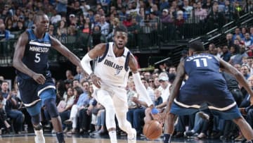 DALLAS, TX - MARCH 30: Nerlens Noel #3 of the Dallas Mavericks handles the ball against the Minnesota Timberwolves on March 30, 2018 at the American Airlines Center in Dallas, Texas. NOTE TO USER: User expressly acknowledges and agrees that, by downloading and or using this photograph, User is consenting to the terms and conditions of the Getty Images License Agreement. Mandatory Copyright Notice: Copyright 2018 NBAE (Photo by Glenn James/NBAE via Getty Images)