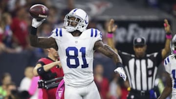 Oct 8, 2015; Houston, TX, USA; Indianapolis Colts wide receiver Andre Johnson (81) throws the ball into the stands after scoring a touchdown during the first quarter against the Houston Texans at NRG Stadium. Mandatory Credit: Troy Taormina-USA TODAY Sports