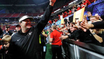 ATLANTA, GA - DECEMBER 02: Head coach Kirby Smart of the Georgia Bulldogs celebrates beating Auburn Tigers in the SEC Championship at Mercedes-Benz Stadium on December 2, 2017 in Atlanta, Georgia. (Photo by Jamie Squire/Getty Images)