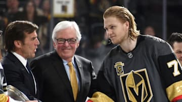 LAS VEGAS, NV - MARCH 31: (L-R) Vegas Golden Knights general manager George McPhee and Chairman, CEO and Governor Bill Foley present William Karlsson