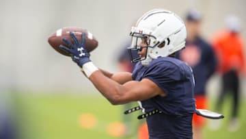 Auburn football wide receiver Jay Fair (5) catches a pass during Auburn Tigers football practice at the Woltosz Football Performance Center at in Auburn, Ala., on Monday, April 3, 2023.