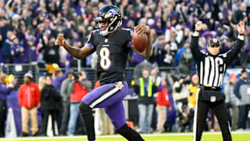 BALTIMORE, MD - DECEMBER 30: Baltimore Ravens quarterback Lamar Jackson (8) runs for a touchdown in the first quarter against the Cleveland Browns on December 30, 2018, at M&T Bank Stadium in Baltimore, MD. (Photo by Mark Goldman/Icon Sportswire via Getty Images)