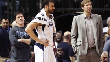 Nov 30, 2016; Dallas, TX, USA; Dallas Mavericks owner Mark Cuban (left) and center Andrew Bogut (middle) and forward Dirk Nowitzki (right) react during the second half against the San Antonio Spurs at American Airlines Center. Mandatory Credit: Kevin Jairaj-USA TODAY Sports