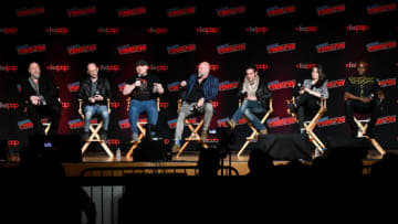 NEW YORK, NEW YORK - OCTOBER 05: (L-R) Warren Ellis, Adam Deats, Sam Deats, Graham McTavish, James Callis, Alejandra Reynoso, Adetokumboh M'Cormack speak on stage during Frederator Studios Castlevania Spotlight Panel at New York Comic Con 2019 Day 3 at Jacob K. Javits Convention Center on October 05, 2019 in New York City. (Photo by Craig Barritt/Getty Images for ReedPOP )