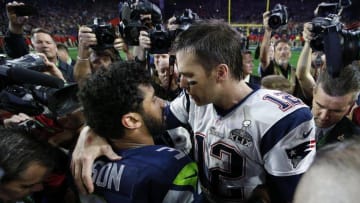 Feb 1, 2015; Glendale, AZ, USA; New England Patriots quarterback Tom Brady (12) greets Seattle Seahawks quarterback Russell Wilson (3) after Super Bowl XLIX at University of Phoenix Stadium. Mandatory Credit: Mark J. Rebilas-USA TODAY Sports