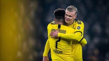 DORTMUND, GERMANY - JANUARY 24: (EDITORS NOTE: Image has been digitally enhanced.) Scorer Erling Haaland (R) of Dortmund celebrates his teams fourth goal with Jadon Sancho (L) during the Bundesliga match between Borussia Dortmund and 1. FC Köln at Signal Iduna Park on January 24, 2020 in Dortmund, Germany. (Photo by Lukas Schulze/Bundesliga/Bundesliga Collection via Getty Images)