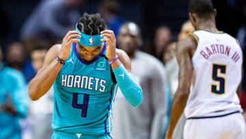 CHARLOTTE, NORTH CAROLINA - MARCH 05: Devonte' Graham #4 of the Charlotte Hornets reacts after a play during the fourth quarter during their game against the Denver Nuggets at Spectrum Center on March 05, 2020 in Charlotte, North Carolina. NOTE TO USER: User expressly acknowledges and agrees that, by downloading and/or using this photograph, user is consenting to the terms and conditions of the Getty Images License Agreement. (Photo by Jacob Kupferman/Getty Images)