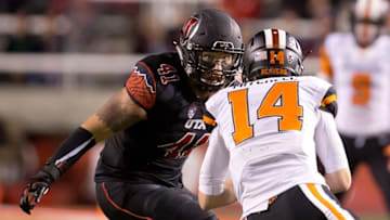 Oct 31, 2015; Salt Lake City, UT, USA; Utah Utes linebacker Jared Norris (41) moves in to tackle Oregon State Beavers quarterback Nick Mitchell (14) during the second half at Rice-Eccles Stadium. Utah won 27-12. Mandatory Credit: Russ Isabella-USA TODAY Sports