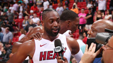 MIAMI, FL - MARCH 17: Dwyane Wade #3 of the Miami Heat talks to the media after the game against the Charlotte Hornets on March 17, 2019 at American Airlines Arena in Miami, Florida. NOTE TO USER: User expressly acknowledges and agrees that, by downloading and or using this Photograph, user is consenting to the terms and conditions of the Getty Images License Agreement. Mandatory Copyright Notice: Copyright 2019 NBAE (Photo by Issac Baldizon/NBAE via Getty Images)
