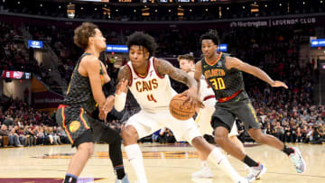 CLEVELAND, OHIO - DECEMBER 23: Kevin Porter Jr. #4 of the Cleveland Cavaliers drives around Trae Young #11 of the Atlanta Hawks during the second half at Rocket Mortgage Fieldhouse on December 23, 2019 in Cleveland, Ohio. The Cavaliers defeated the Hawks 121-118. NOTE TO USER: User expressly acknowledges and agrees that, by downloading and/or using this photograph, user is consenting to the terms and conditions of the Getty Images License Agreement. (Photo by Jason Miller/Getty Images)