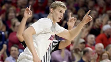 Dec 6, 2016; Tucson, AZ, USA; Arizona Wildcats forward Lauri Markkanen (10) celebrates after scoring against the UC Irvine Anteaters during the second half at McKale Center. Arizona won 79-57. Mandatory Credit: Casey Sapio-USA TODAY Sports